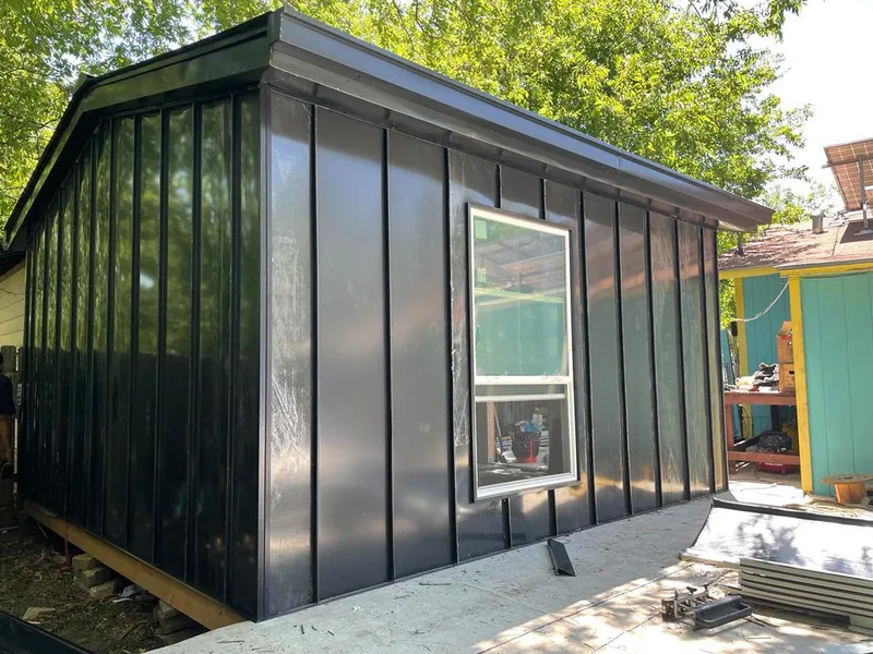 Black standing seam metal wall panels for Metal Roof Installation in Red Hook